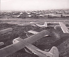 Aircraft Picture - During Operation Market-Garden, the 101st Airborne Division was reinforced with twelve gliders on 18 September 1944. Here, Waco gliders are lined up on an English airfield in preparation for the next lift to Holland.