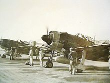 Aircraft Picture - Captured Kawanishi N1K2-Js (note US markings) having their Homare engines run up by former JNAF groundcrew.
