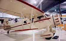 Aircraft Picture - Waco CUC of 1935 showing the extended cabin and windows of the later C series models. Anoka-Blaine airport near Minneapolis, June 2006