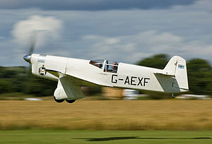 Airplane Picture - Percival Mew Gull G-AEXF at Breighton Aerodrome, UK being piloted by Tony (“Taff”) Smith on 14 July 2007, photograph by Michael Rushforth.