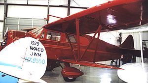 Airplane Picture - Waco AVN-8 cabin biplane of 1938 with fixed spatted tricycle undercarriage displayed airworthy at the Historic Aircraft Restoration Museum, Creve Coeur Airport near St Louis