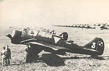 Airplane Picture - PZL.23A Karas on the Warsaw Airport. Note lines of PZL P.11 or PZL P.7 fighters in the background