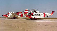 Airplane Picture - U.S. Coast Guard Grumman HU-16E Albatross and a Sikorsky HH-52A Seaguard in March 1964, probably at CGAS Mobile, AL