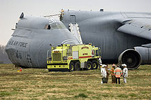 Airplane Picture - Emergency responders at the scene of a C-5B crash at Dover AFB, Del., April 2006