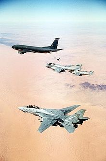 Airplane Picture - An F-14A Tomcat from VF-32 during Desert Storm. A KC-135 Stratotanker and two EA-6B Prowlers can be seen in the background.