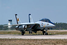 Airplane Picture - The last American F-14 to fly a combat mission, an F-14D(R) from VF-213, lands at Sherman Field at Naval Air Station Pensacola, Florida.