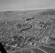 Airplane Picture - The two XR6V Constitutions in flight over San Francisco in 1950