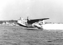 Airplane Picture - A US Coast Guard PBM takes off from the water assisted by RATO.