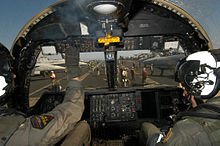 Airplane Picture - Two Naval Aviators conducting pre-flight checks in the cockpit of a S-3B Viking, aboard the USS John F. Kennedy (CV 67)