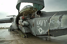 Airplane Picture - The forward section of the C-5 Galaxy lifts open to allow loading of bulky items, such as this MH-53 helicopter.