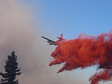 Airplane Picture - Neptune Aviation Services' P-2V Neptune drops Phos-Chek on the 2007 WSA Complex fire in Oregon.