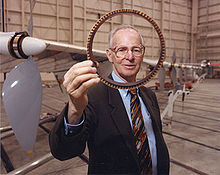 Aircraft Picture - AeroVironment Chairman Paul MacCready shows a cross section of the AeroVironment/NASA Helios Prototype wing spar.