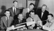 Airplane Picture - The Mercury Seven astronauts with an Atlas model July 12, 1962. L to R: Grissom, Shepard, Carpenter, Schirra, Slayton, Glenn, Cooper