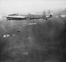 Airplane Picture - RAAF Lincoln bomber dropping 500 lb bombs on Communist targets during the Malayan Emergency, c. 1950