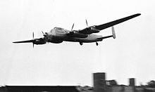 Airplane Picture - Avro Lincoln testbed G-37-1 at the Farnborough SBAC Show in 1956, flying solely on its nose-mounted Rolls-Royce Tyne