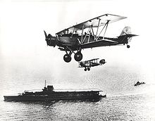 Airplane Picture - Fleet Air Arm Blackburn Shark in company with a Westland Wapiti, seen flying over HMS Courageous.