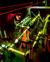 Airplane Picture - A technician evaluates the interaction of multiple lasers that will be used aboard the Airborne Laser.