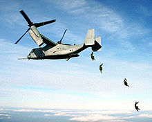 Airplane Picture - U.S. Marines jump from an Osprey.