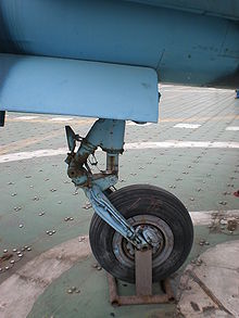 Airplane Picture - The forward landing gear of the old Q-5