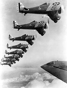 Airplane Picture - Formation of nine Boeing P-26s of the 20th Pursuit Group.
