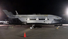 Airplane Picture - The X-37B sits on the runway at Vandenberg AFB after landing