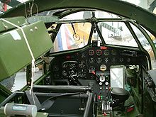 Airplane Picture - Blenheim Mk IV cockpit. Note the asymmetry of the instrument console, indicating the position of the scooped out area of the nose in front of the pilot. The ring and bead gunsight for the forward firing guns is visible.