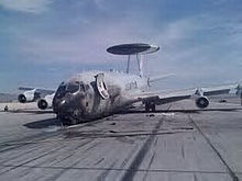 Airplane Picture - Fire-damaged USAF E-3 on Nellis AFB, NV ramp.