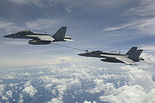 Airplane Picture - An F/A-18F refueling an F/A-18E over the Bay of Bengal, 2007