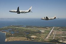 Airplane Picture - The U.S. Navy’s newest maritime patrol and reconnaissance aircraft, P-8A Poseidon flies with a P-3 Orion along side, prior to landing at Naval Air Station Patuxent River, Maryland in 2010.