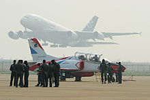 Airplane Picture - A K-8 of the Pakistan Air Force aerobatics team, Sher Dils, at the airfield during the Zhuhai Air Show 2010.
