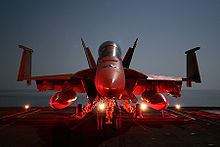 Airplane Picture - An F/A-18F parked on the flight deck of aircraft carrier USS Dwight D. Eisenhower, as the ship operates in the Arabian Sea, December 2006