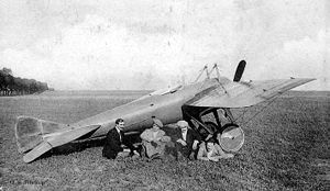 Warbird Picture - An early Deperdussin Monocoque sports plane with a single-row engine (the racers had double-row Gnome Double Lambda engines) and four of its pilots. From left to right: Guillaume Busson, Ren Vidart, Jules Vdrines and Maurice Prevost