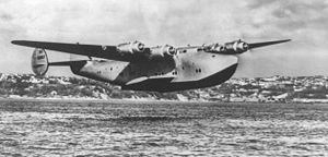 Warbird Picture - A Boeing 314 “Clipper” flying low