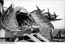 Airplane Picture - The Me 323 unloading a Renault UE in Tunisia.