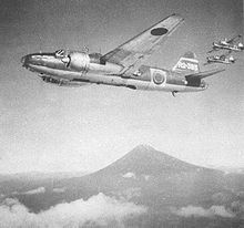 Airplane Picture - Mid- or late-production G4M1 Model 11s with the propeller spinners and rubber ply beneath the wing fuel tanks.