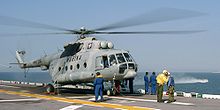 Airplane Picture - A Mexican Navy Mi-17 helicopter stands by for passengers on the flight deck aboard the amphibious assault ship USS Bataan (LHD 5), off the coast of Mississippi.