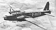 Airplane Picture - The Merlin-engined Wellington Mark II. This aircraft belongs to No. 104 Sqn.. Notice the criss-cross geodesic construction through the perspex fuselage panels.