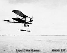 Airplane Picture - Vildebeest Mk II of No. 100 Squadron RAF making a torpedo drop during target practice, circa 1936.