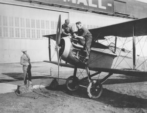 Warbird Picture - Mechanics work on a VE-7