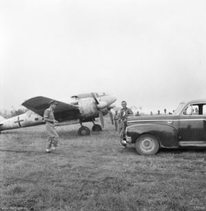 Airplane Picture - Mitsubishi Ki-46-III white painted with a green cross on the rear fuselage as a sign of surrender, captured by KNIL forces on October 3, 1945. Menado, Celebes.