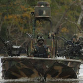 Airplane Picture - SWCC crewmen man a special operations craft