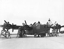 Airplane Picture - Maintenance mechanics at Laredo Army Air Field, Texas, give a Consolidated B-24 Liberator a complete overhaul before flight, 8 February 1944.