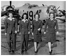 Airplane Picture - WASP pilots (left to right) Eloise Huffines Bailey, Millie Davidson Dalrymple, Elizabeth McKethan Magid and Clara Jo Marsh Stember, with a B-24 in the background