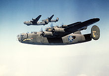 Airplane Picture - B-24Ds of 93rd Bomb Group in formation. Nearest aircraft is Joisey Bounce (s/n 41-24226), wingman is The Duchess, (s/n 41-24147), and next higher is Bomerang (s/n 41-23722).