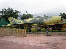 Airplane Picture - A J-7 in green camouflage colors