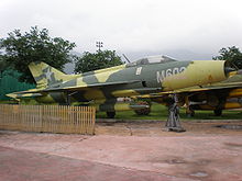 Airplane Picture - A J-7 in green camouflage colors