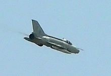 Airplane Picture - A Pakistan Air Force F-7P in flight over Lahore.