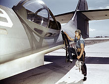 Airplane Picture - PBY waist gunner mounting port side gun blister.