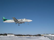 Airplane Picture - Perimeter Aviation C-FTNV SA226-TC Metro II landing at Tadoule Lake, Manitoba c.2006
