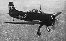 Airplane Picture - A U.S. Navy SC-1 from the USS Duluth (CL-87) over Shanghai, China in 1948